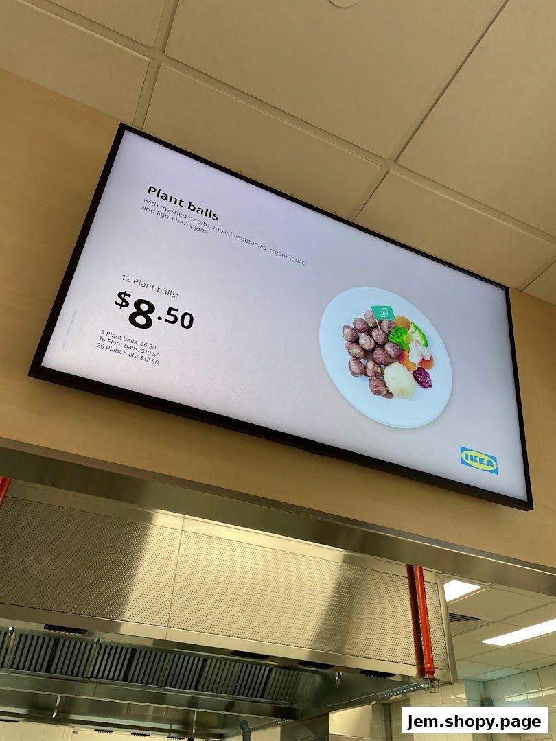 A digital menu board displays IKEA's plant balls with mashed potato, mixed vegetables, and lingonberry jam.
