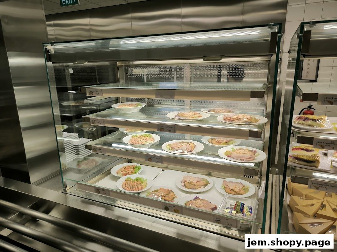 Display case filled with pre-packaged meals and desserts at IKEA Jurong Restaurant.