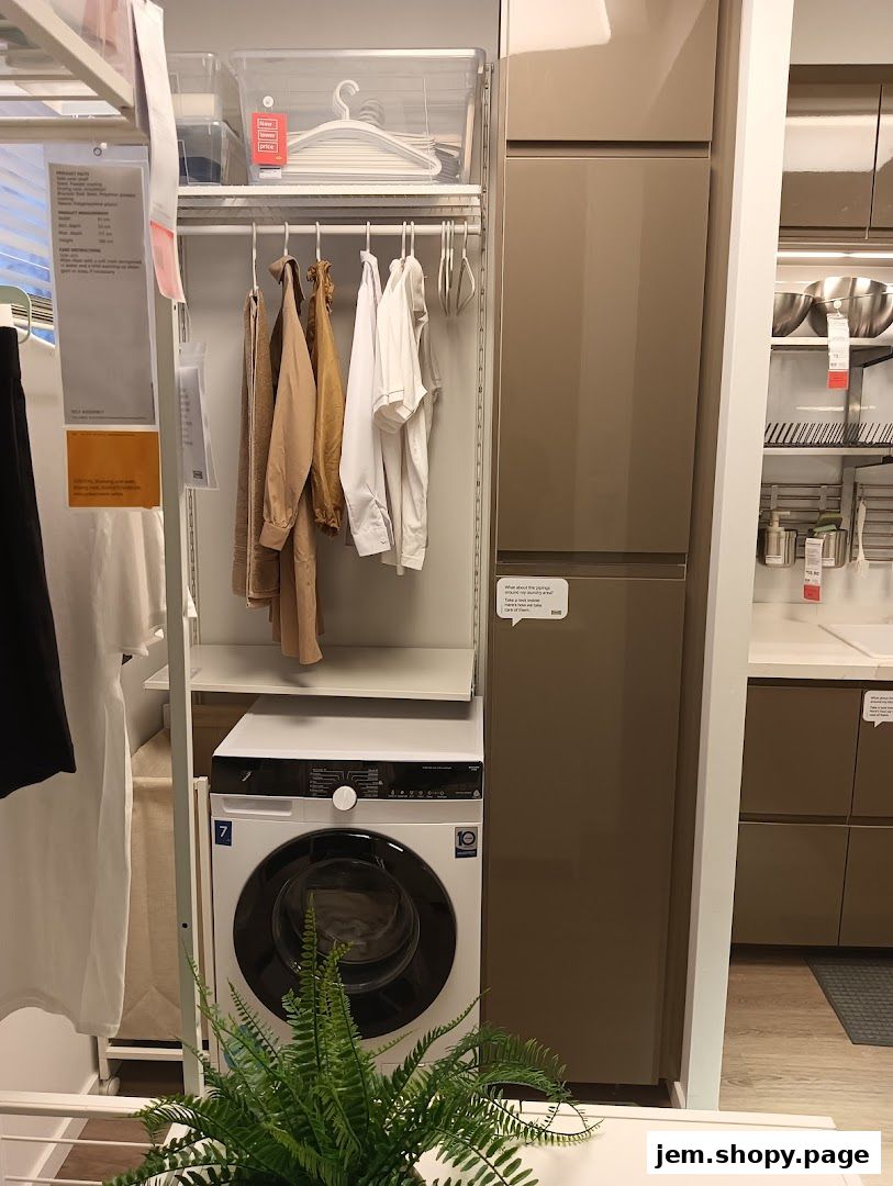 IKEA Jurong display of a modern laundry area with a washing machine and storage.