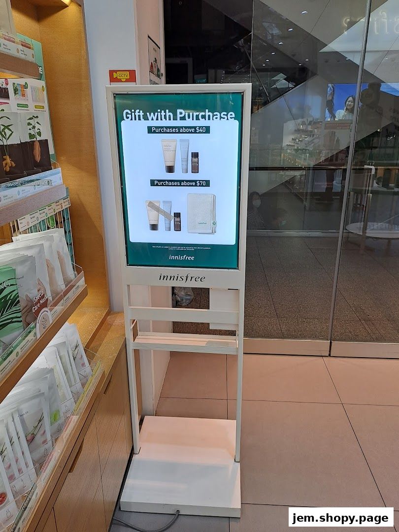 Innisfree shop display promoting a gift with purchase offer.