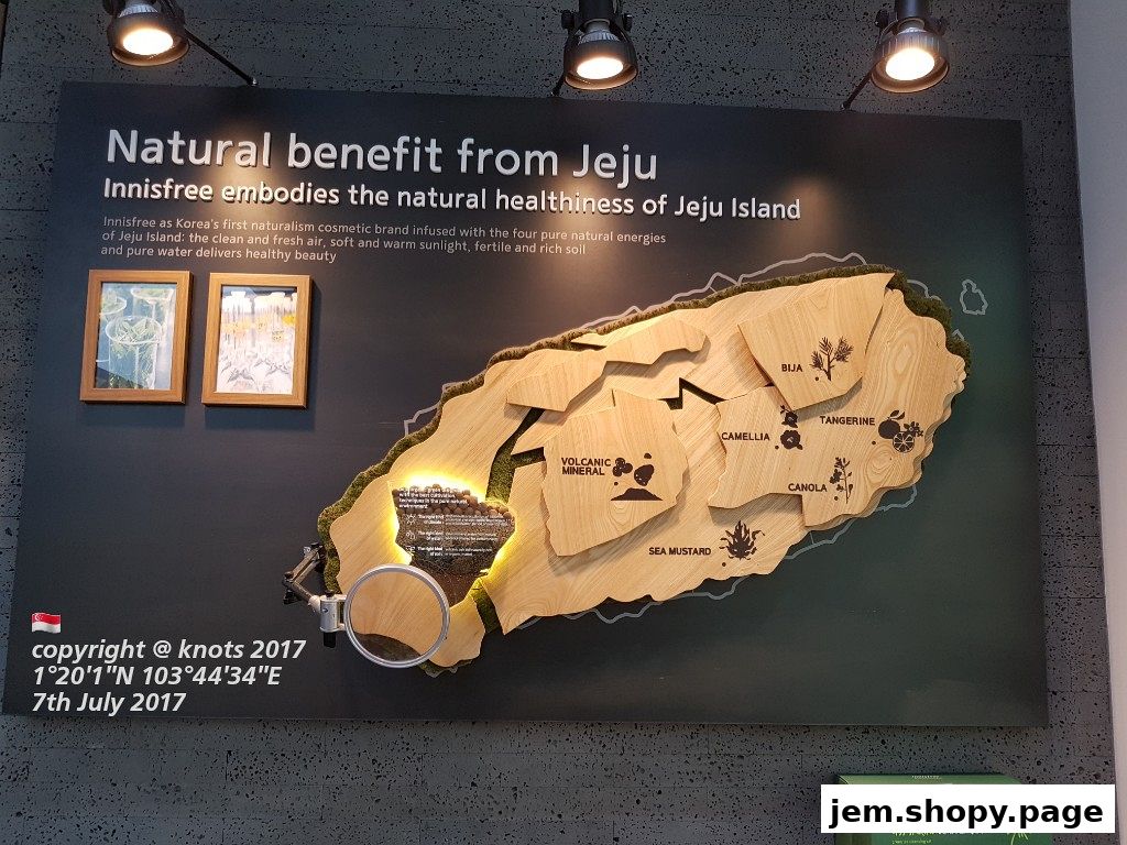 Innisfree Jeju Island natural benefits display with map and product information.
