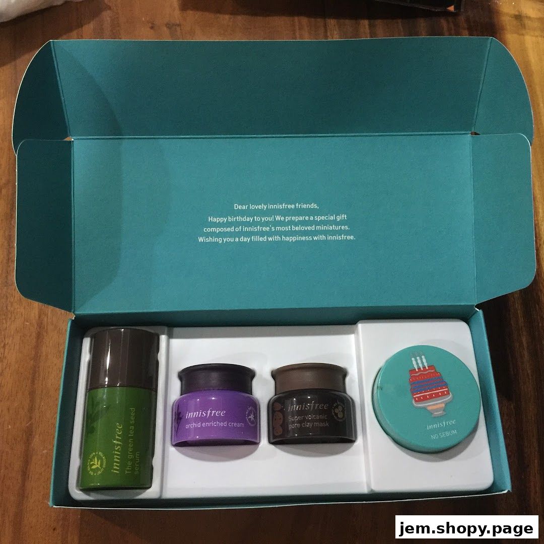 Innisfree gift box with miniature skincare products and a birthday cake design.