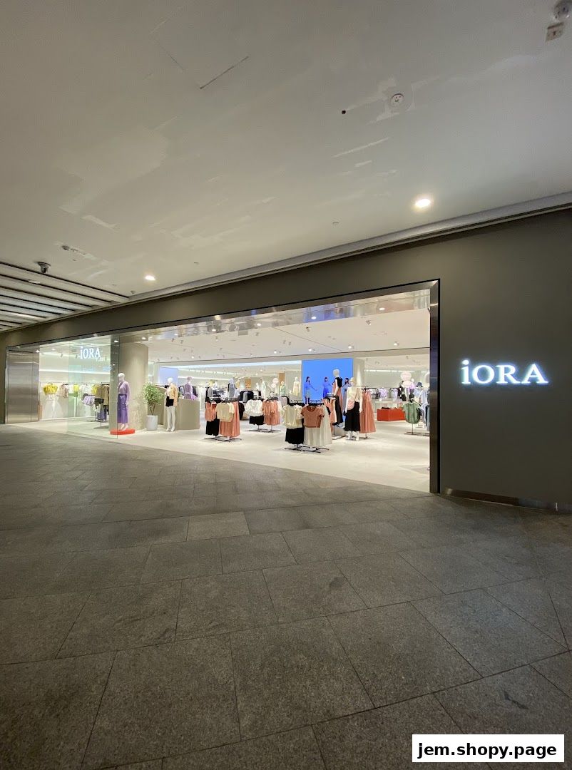 The exterior of the iORA JEM clothing store, showcasing its merchandise and storefront.
