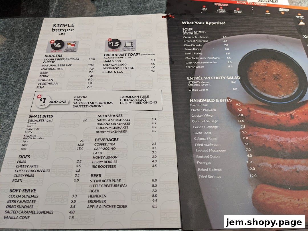 A menu from iSTEAKS Jem featuring burgers, sides, milkshakes, and specialty entrees.