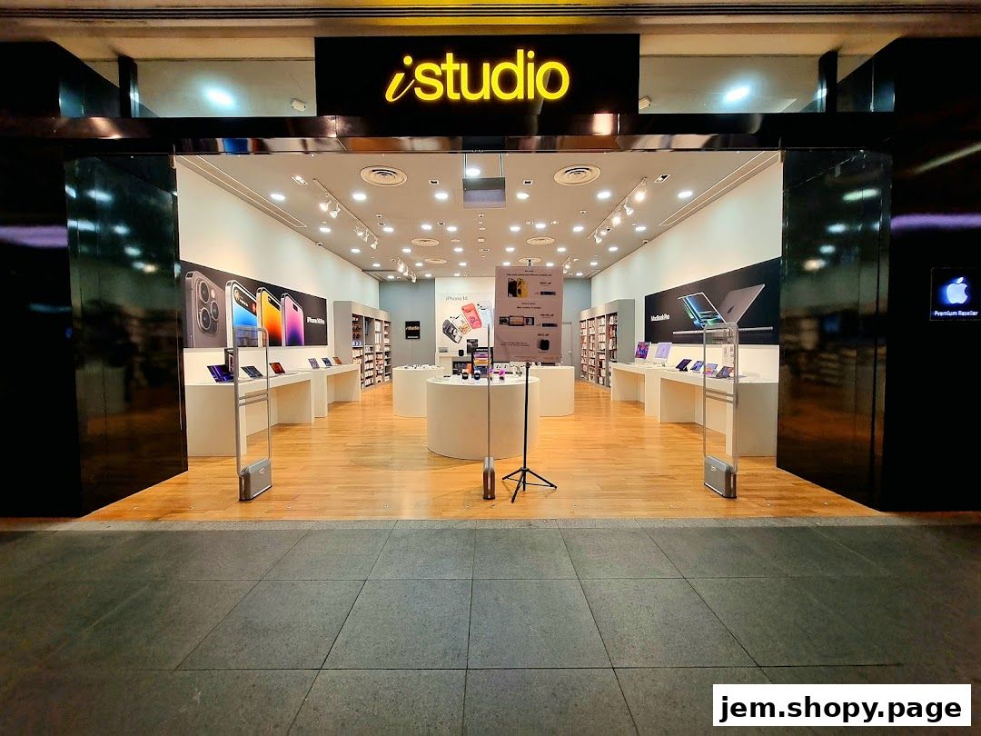 The entrance of an iStudio Apple Premium Reseller store showcasing various Apple products.