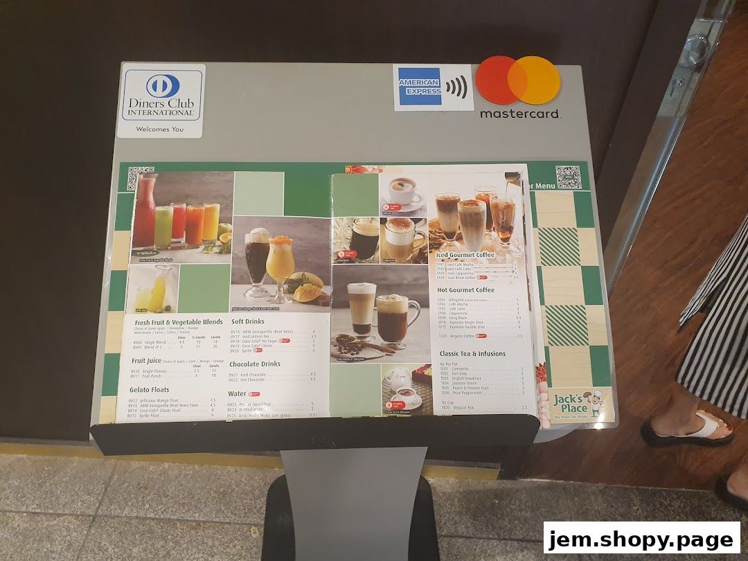 A menu board for Jack's Place restaurant, displaying drinks and coffee options.