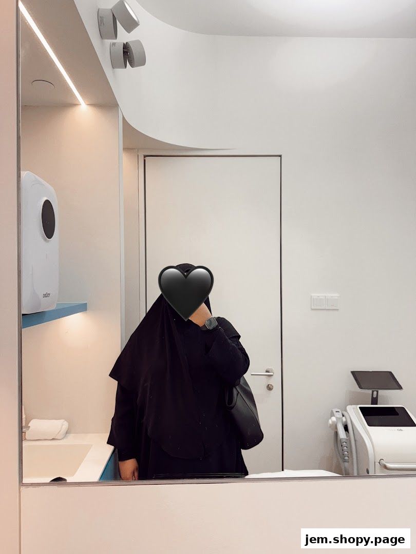 Reflection of a person in a modern beauty clinic with treatment equipment.
