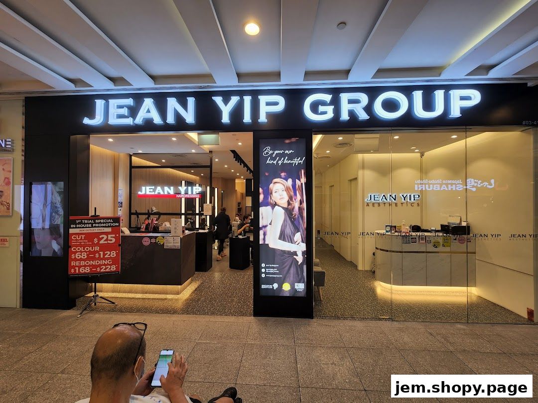 The exterior of Jean Yip Hairdressing and Jean Yip Aesthetics shops in a mall.