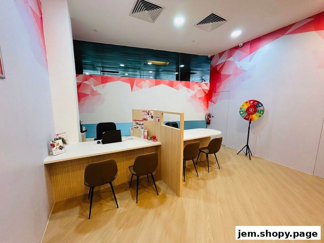 Interior of a modern shop with a reception desk, seating, and promotional wheel.