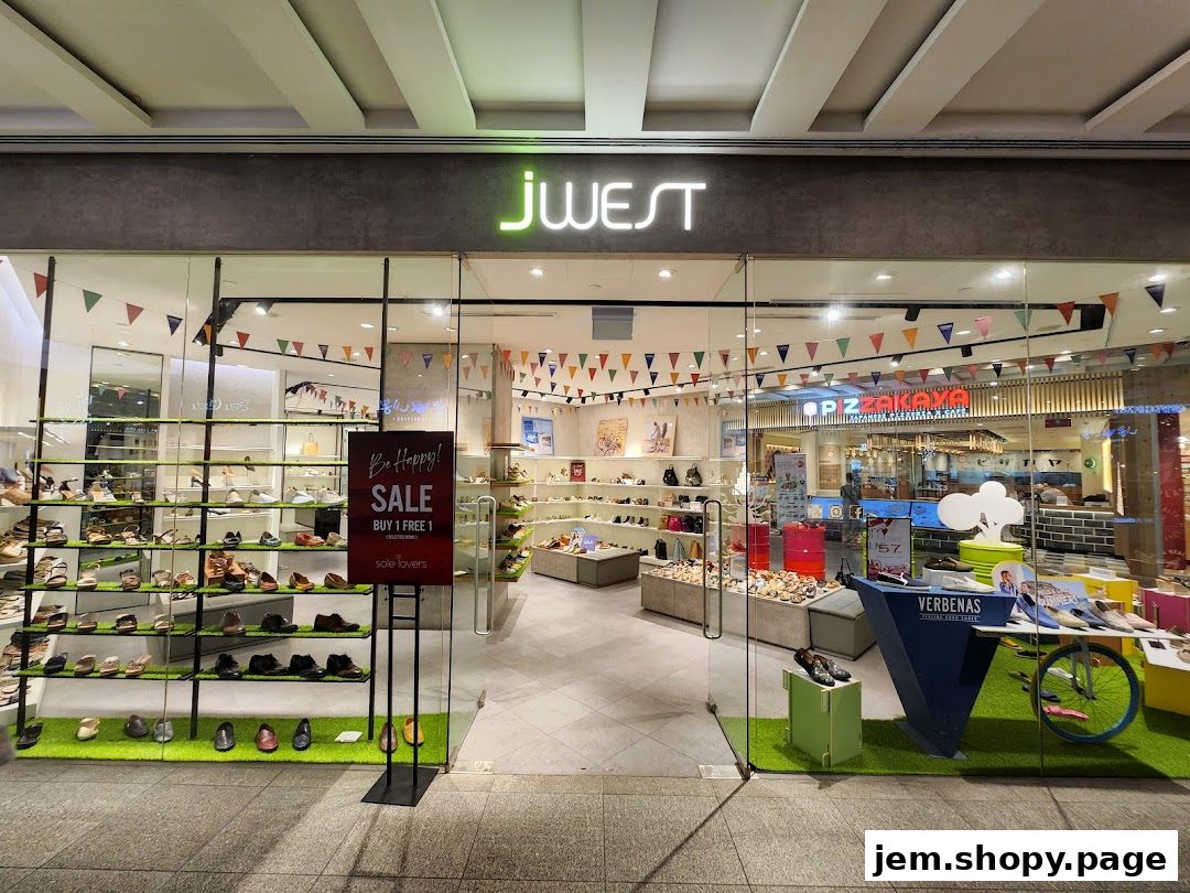 The Jwest shoe store features a wide selection of footwear displayed on shelves and in the window.