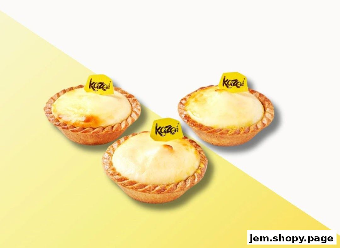 Three delicious cheese tarts from Kazo, each with a branded yellow flag.