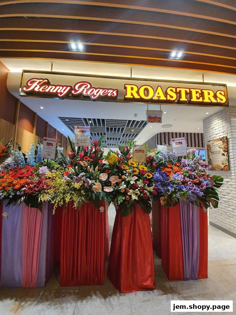 Kenny Rogers Roasters Singapore storefront decorated with vibrant floral arrangements.
