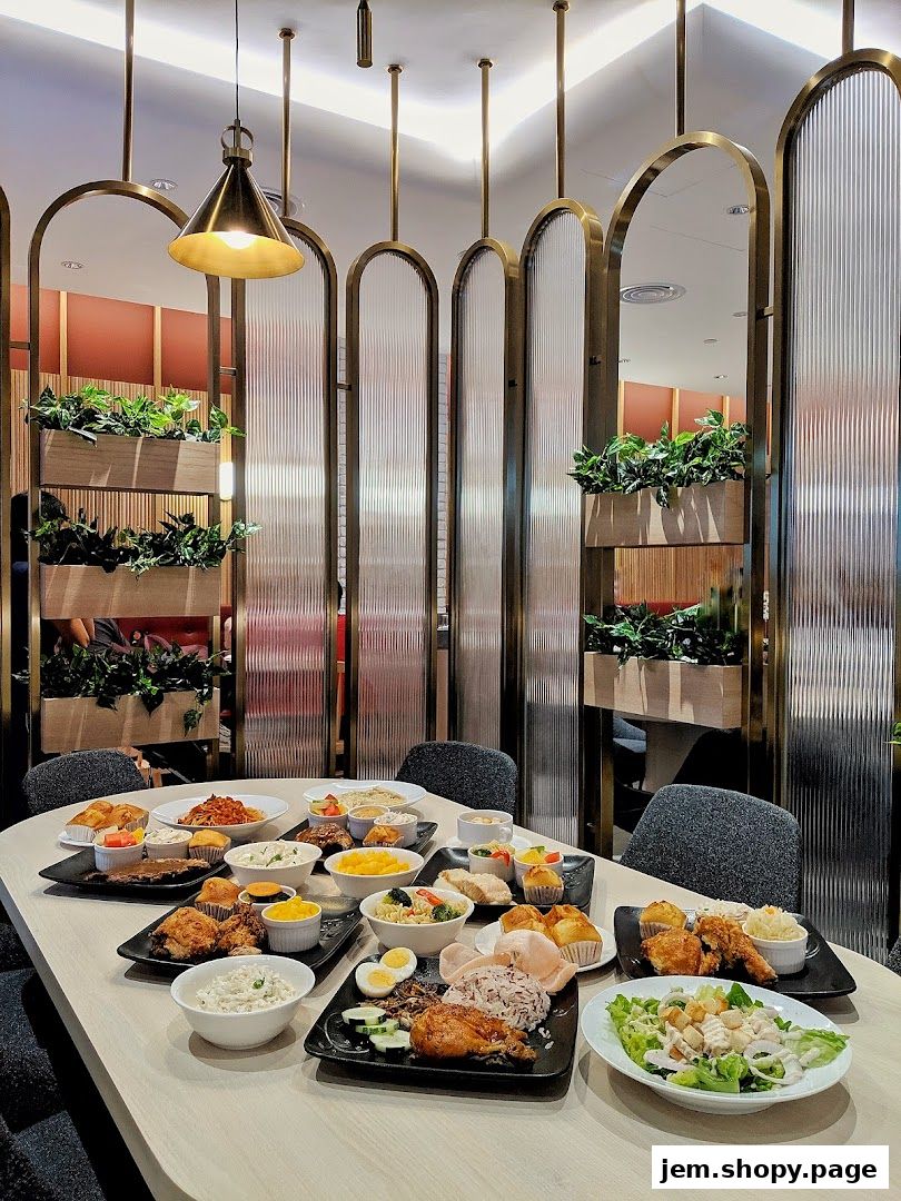 A table laden with a variety of delicious dishes from Kenny Rogers Roasters.