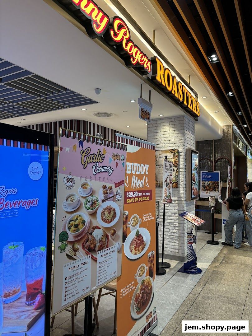 Kenny Rogers Roasters Singapore storefront with promotional posters and signage.