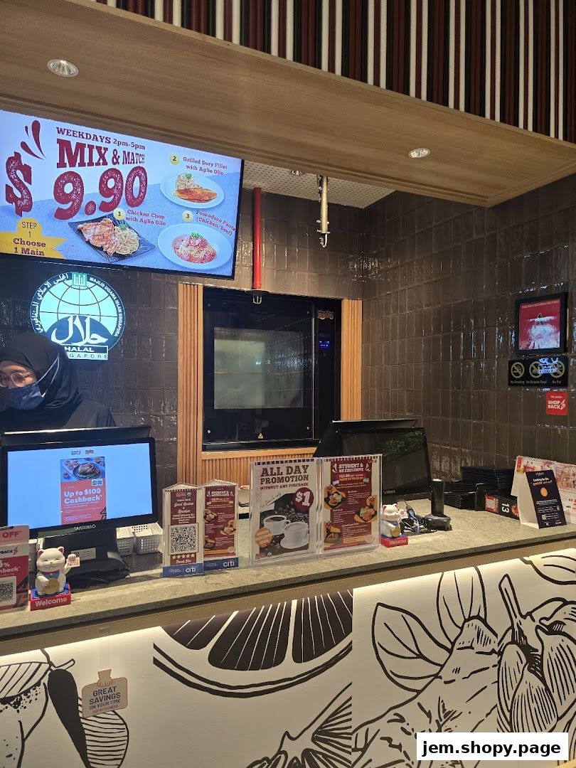 A counter at Kenny Rogers Roasters with a digital menu board and promotional flyers.