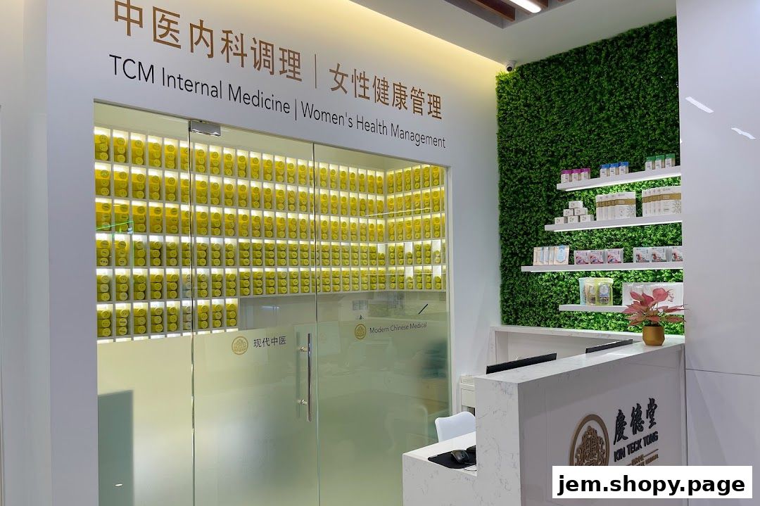 Entrance of Kin Teck Tong TCM Clinic with shelves of herbal medicine and a reception desk.