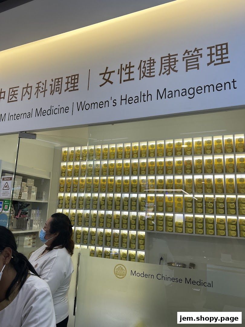 Entrance of Kin Teck Tong TCM Clinic JEM, featuring Chinese medicine and women's health services.