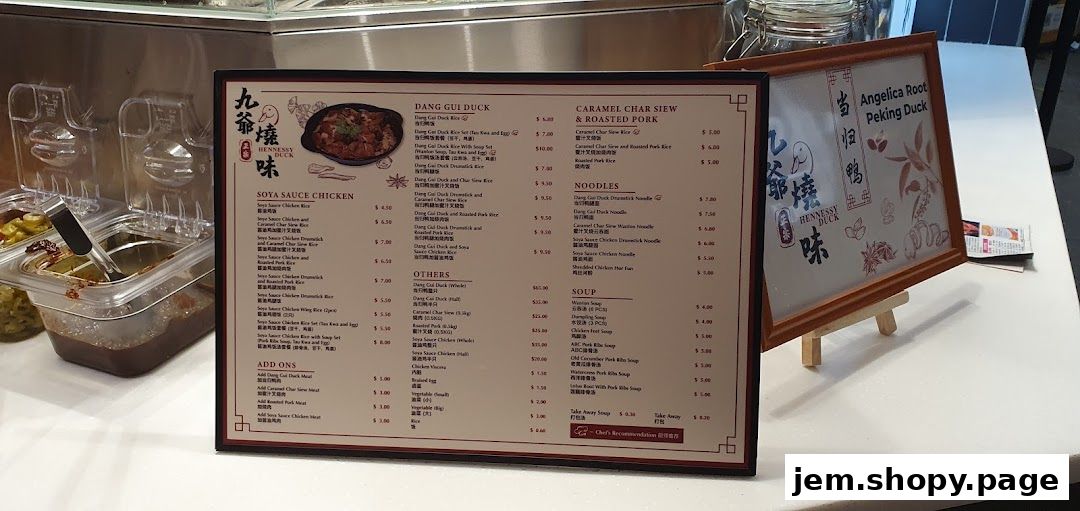 A menu board displays various duck, chicken, and pork dishes with prices.