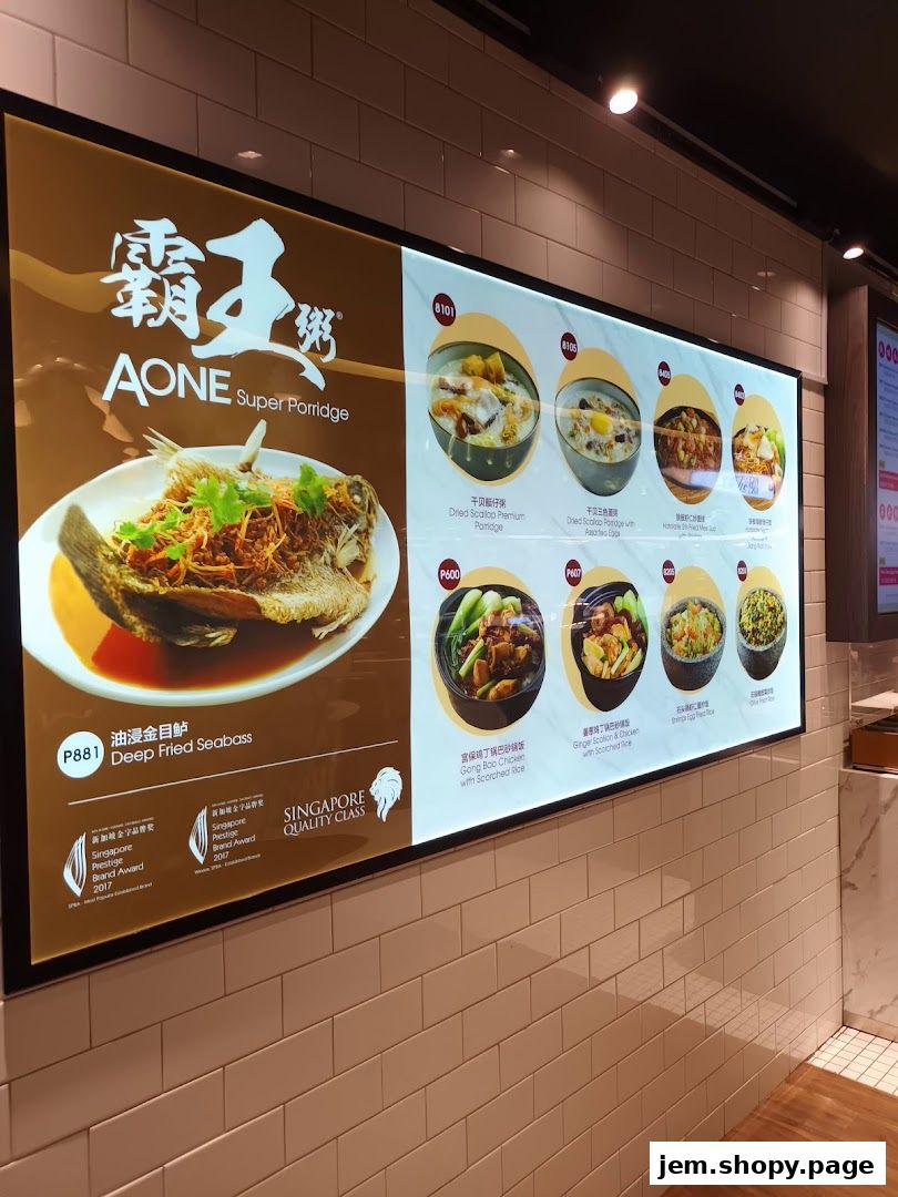 A food menu display featuring AONE Super Porridge and various dishes like Deep Fried Seabass.