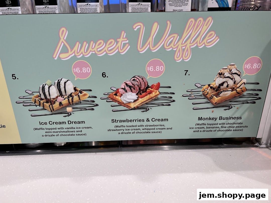 A menu display showcasing three sweet waffle options with ice cream and toppings.
