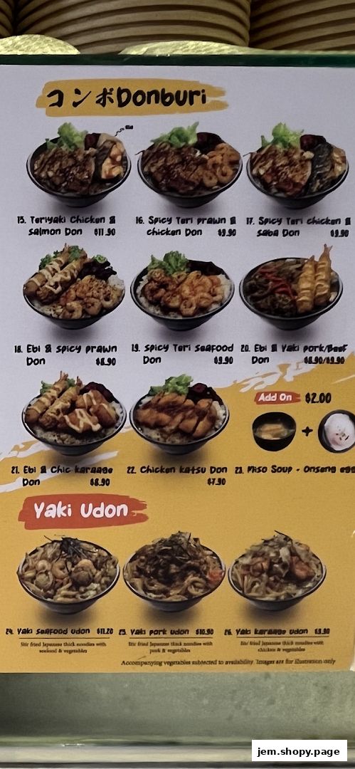 A menu board displaying various Donburi and Yaki Udon dishes with prices.