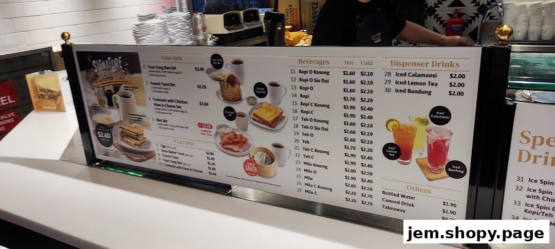A menu board displaying value sets, a la carte items, beverages, and dispenser drinks.