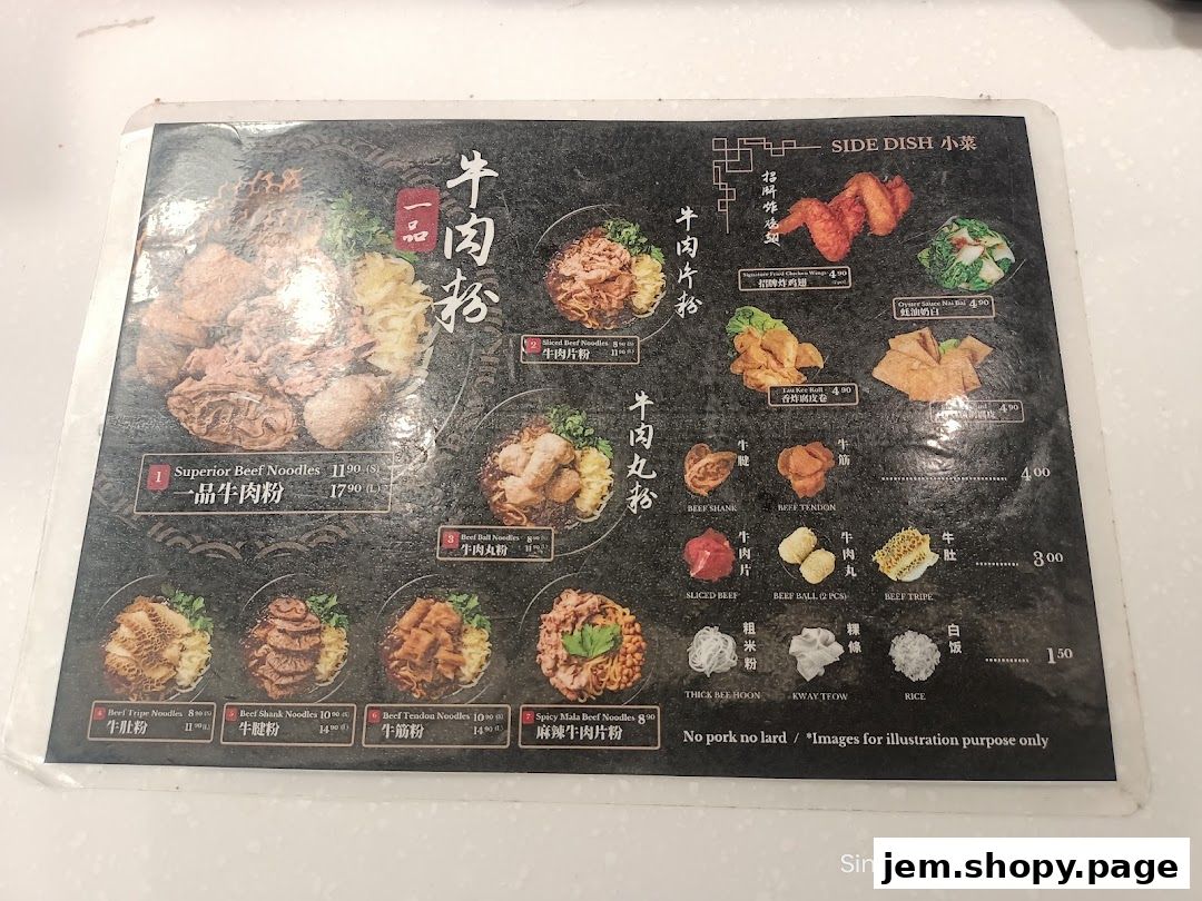 A menu for Kopitiam Food Hall featuring various beef noodle dishes and side dishes.