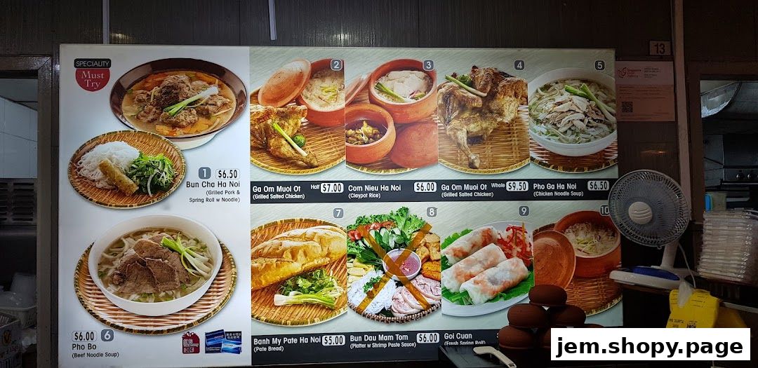 A menu board displaying various Vietnamese dishes with images and prices.