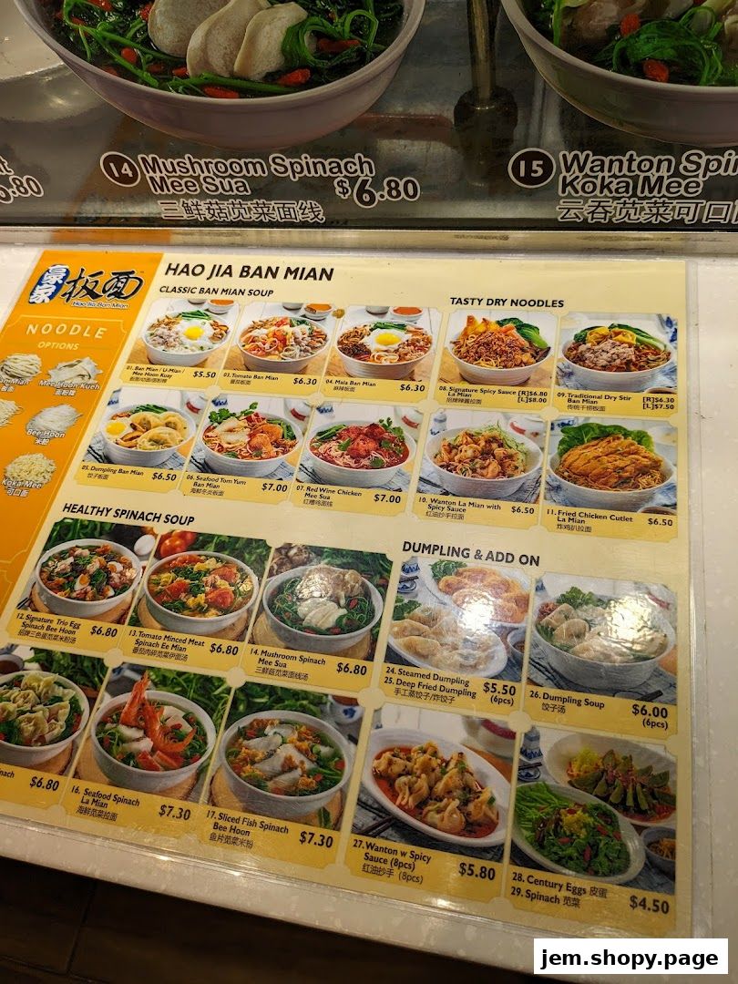 A menu for Kopitiam Food Hall featuring various noodle dishes, soups, and dumplings.