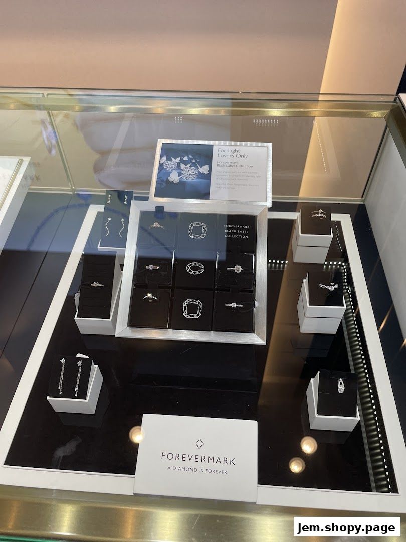 A display case showcasing diamond rings and earrings from Forevermark's Black Label Collection.