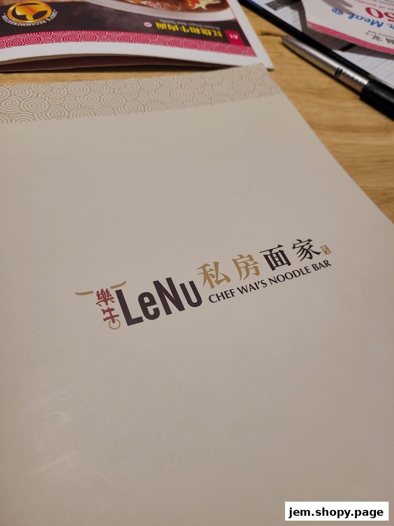 A menu cover for LeNu Chef Wai's Noodle Bar with Chinese and English text.