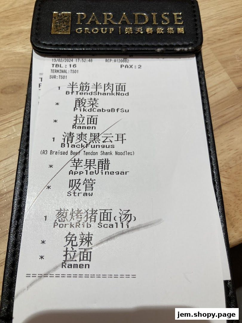 A receipt from LeNu Chefs Wai Noodle Bar showing noodle dishes and side orders.