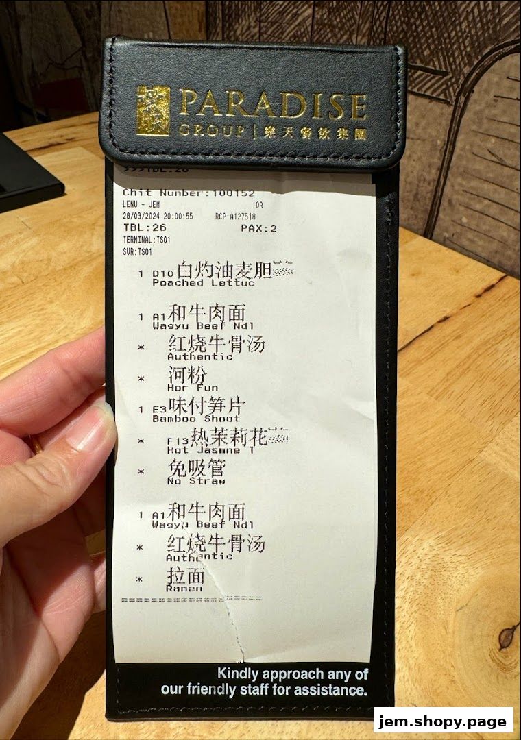 A receipt from LeNu Chefs Wai Noodle Bar showing ordered food items.
