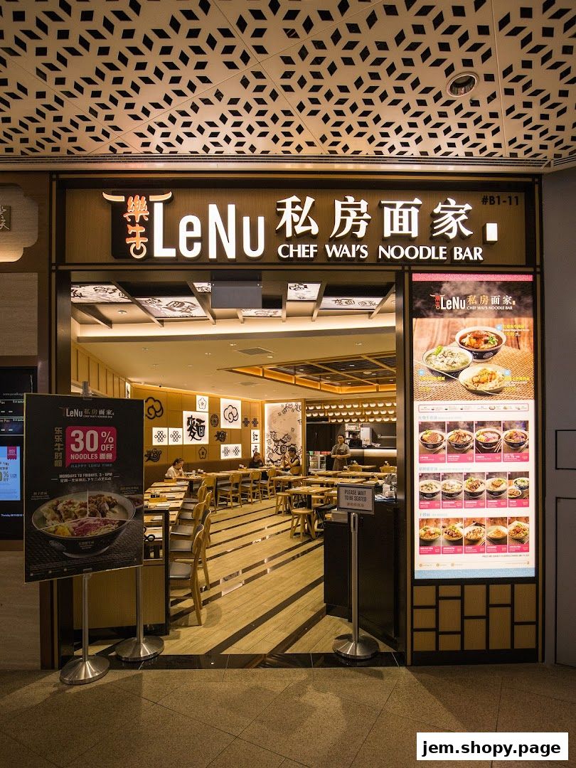 The entrance of LeNu Chef Wai's Noodle Bar at JEM, showcasing its signage and interior.