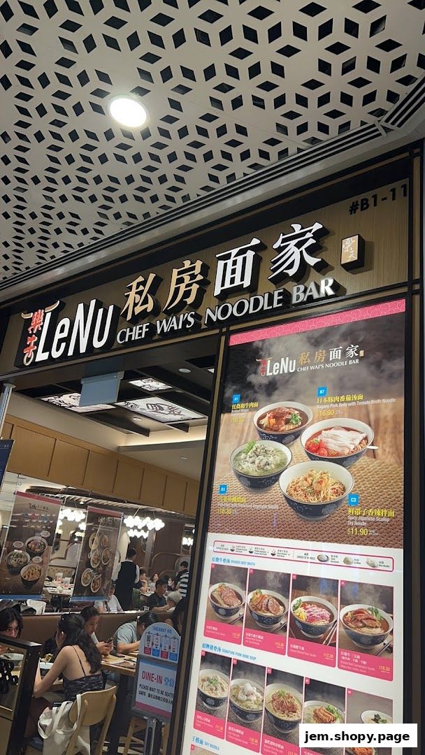 A menu display for LeNu Chef Wai's Noodle Bar showcasing various noodle dishes.