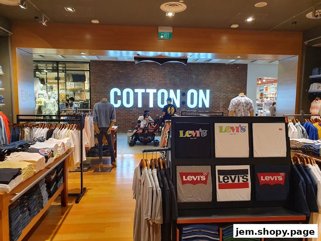 Interior view of a Cotton On store showcasing Levi's t-shirts and apparel.