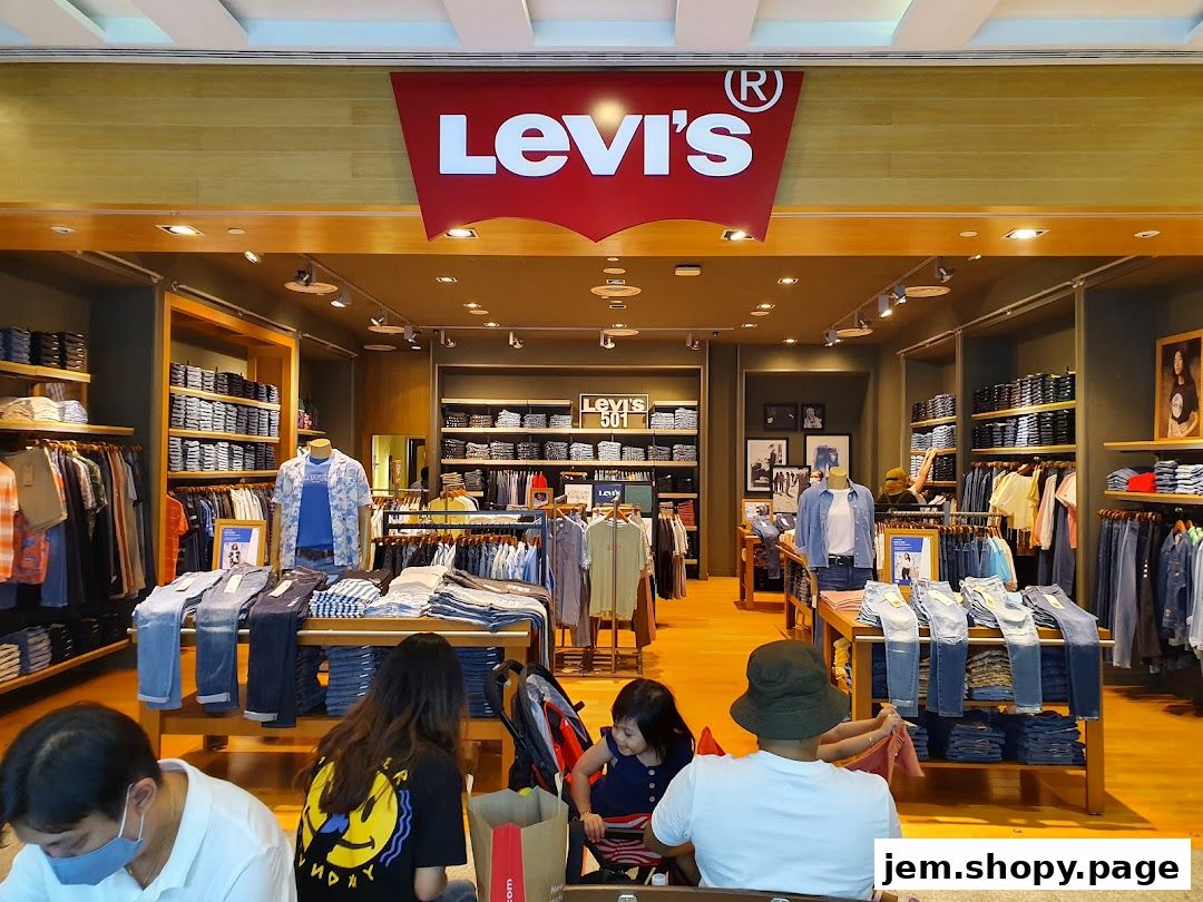 Interior view of a Levi's store showcasing jeans, shirts, and apparel on display.