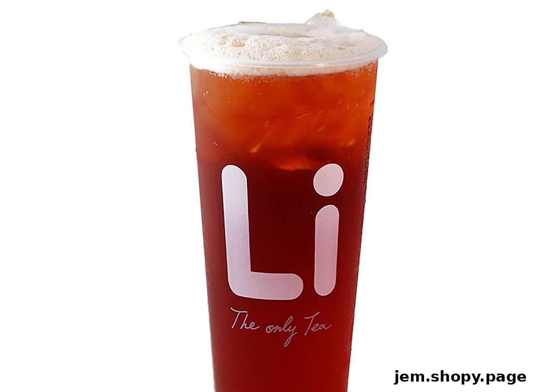 A tall cup of LiHO TEA with a foamy top and ice, featuring the brand logo.