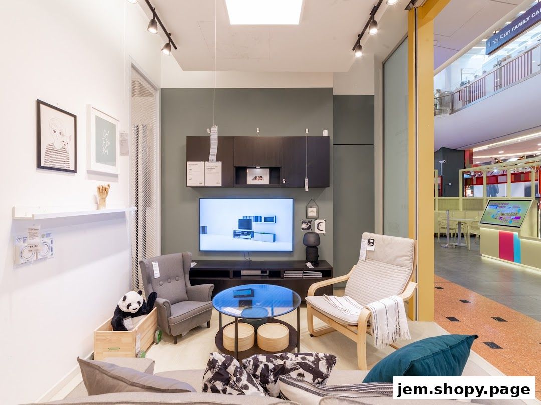 A modern living room display with furniture, TV, and decor, showcasing a home interior setup.