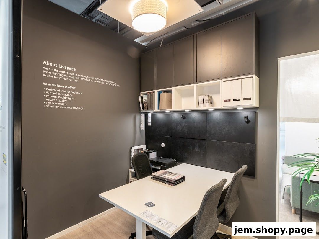 Interior view of Livspace, showcasing a consultation area with a desk and chairs.