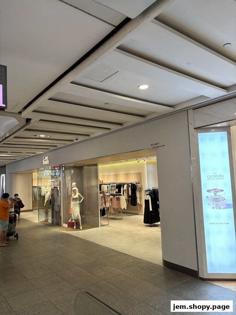The entrance and interior of a women's fashion clothing store, Love, Bonito.