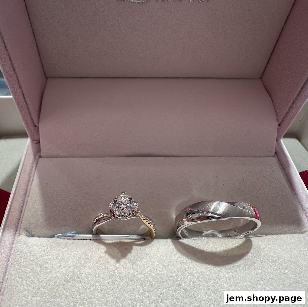 A diamond engagement ring and a wedding band displayed in a jewelry box.