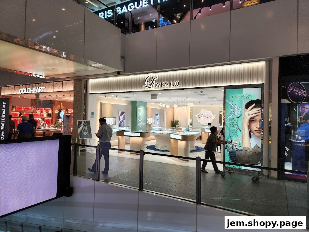 The exterior of the Love & Co. jewelry store, showcasing engagement rings and wedding bands.