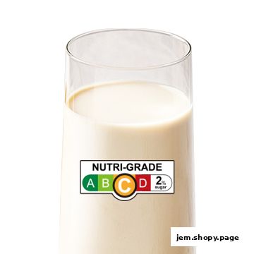 A glass of milk with a Nutri-Grade label showing a 'C' rating and 2% sugar.