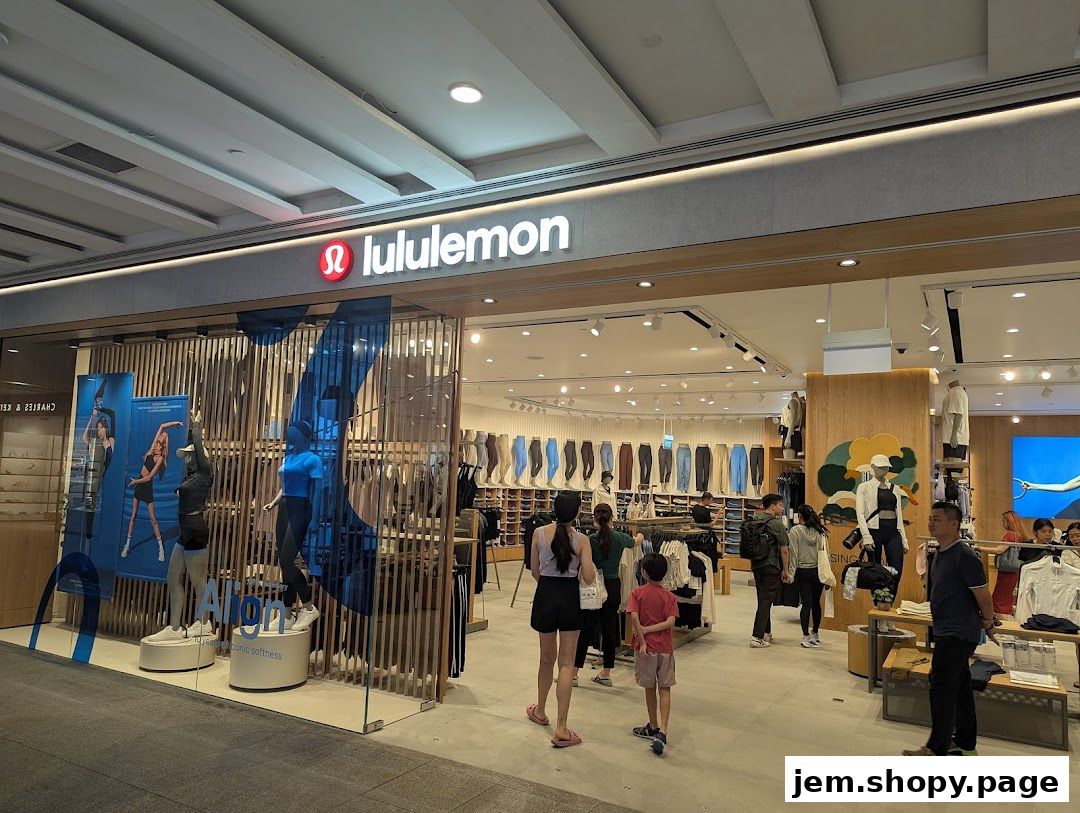 The lululemon store entrance with mannequins and activewear displayed inside.