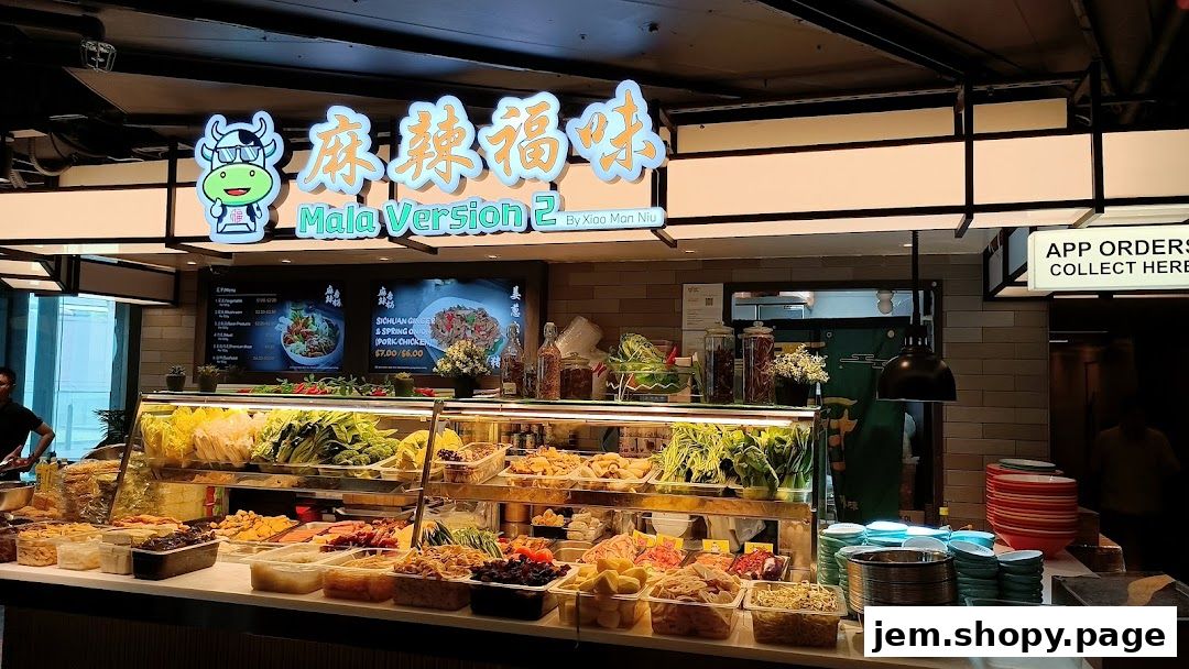 A food stall with a variety of fresh ingredients displayed for mala dishes.