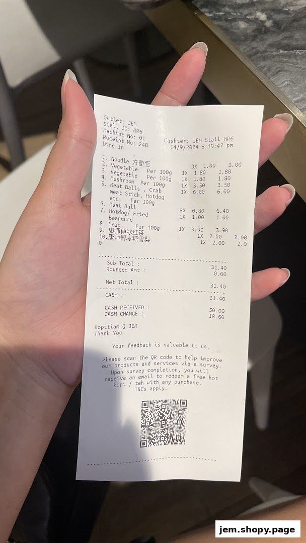 A receipt from Mala Version 2 showing purchased items and their prices.