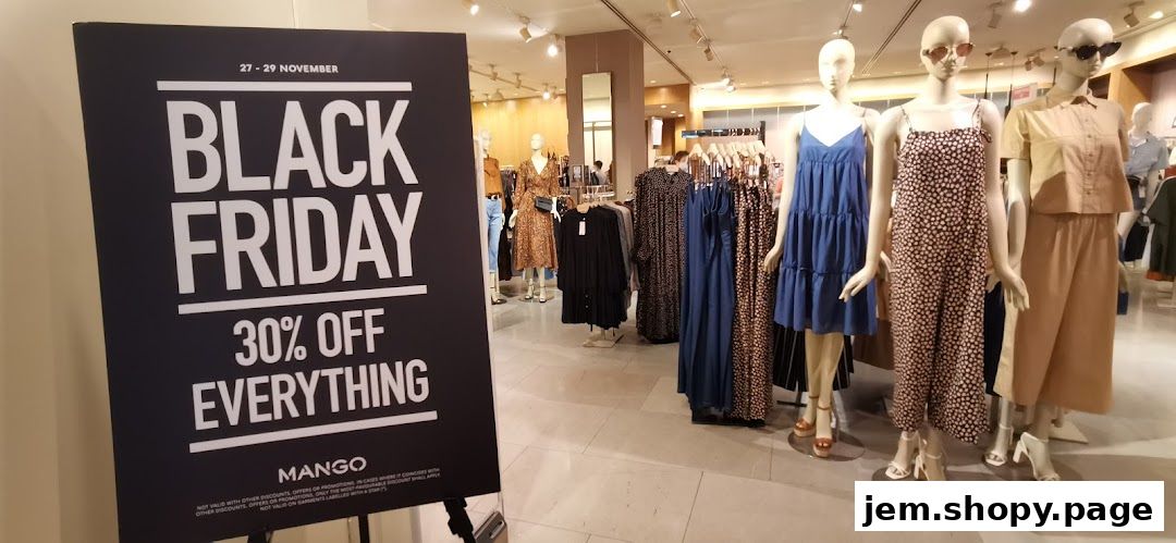 MANGO store interior with mannequins displaying clothing and a Black Friday sale sign.