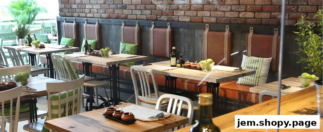 Interior of a restaurant with wooden tables, chairs, and brick walls.