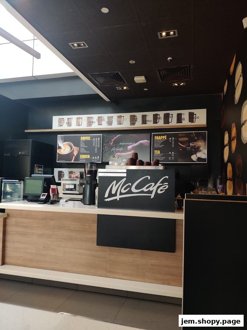 McCafé counter with coffee and frappe menus displayed.